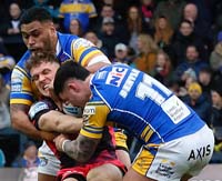 RooneyFletcher-Tackled1-2-0325jh