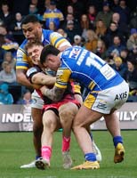 RooneyFletcher-Tackled2-2-0325jh